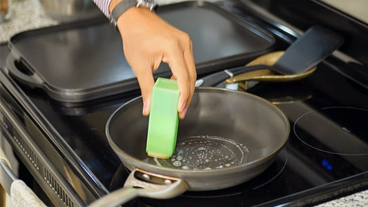 The Butter Crayon being used to butter a hot pan.
