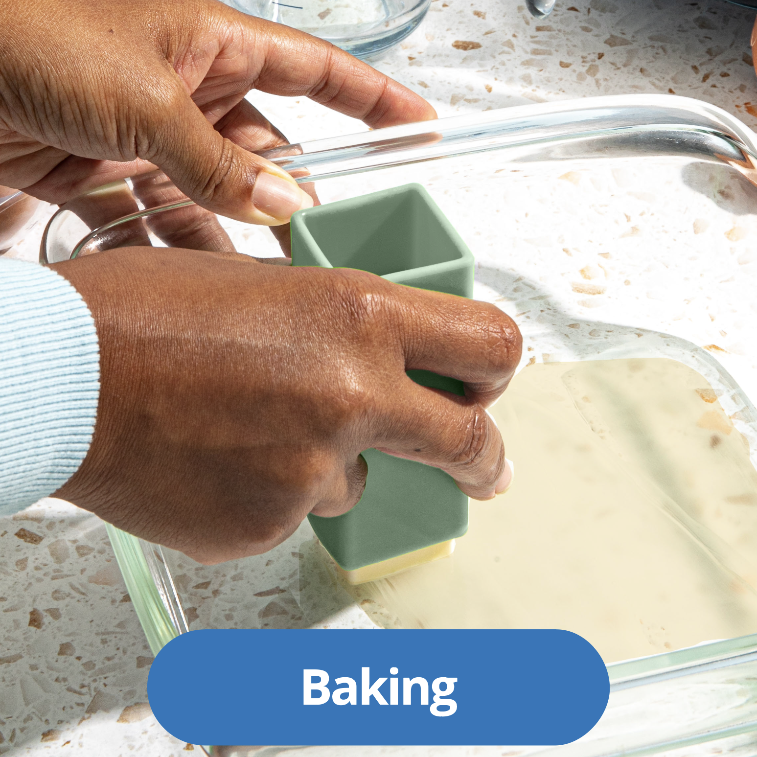 Greasing a baking dish with a Butter Crayon for mess-free prep