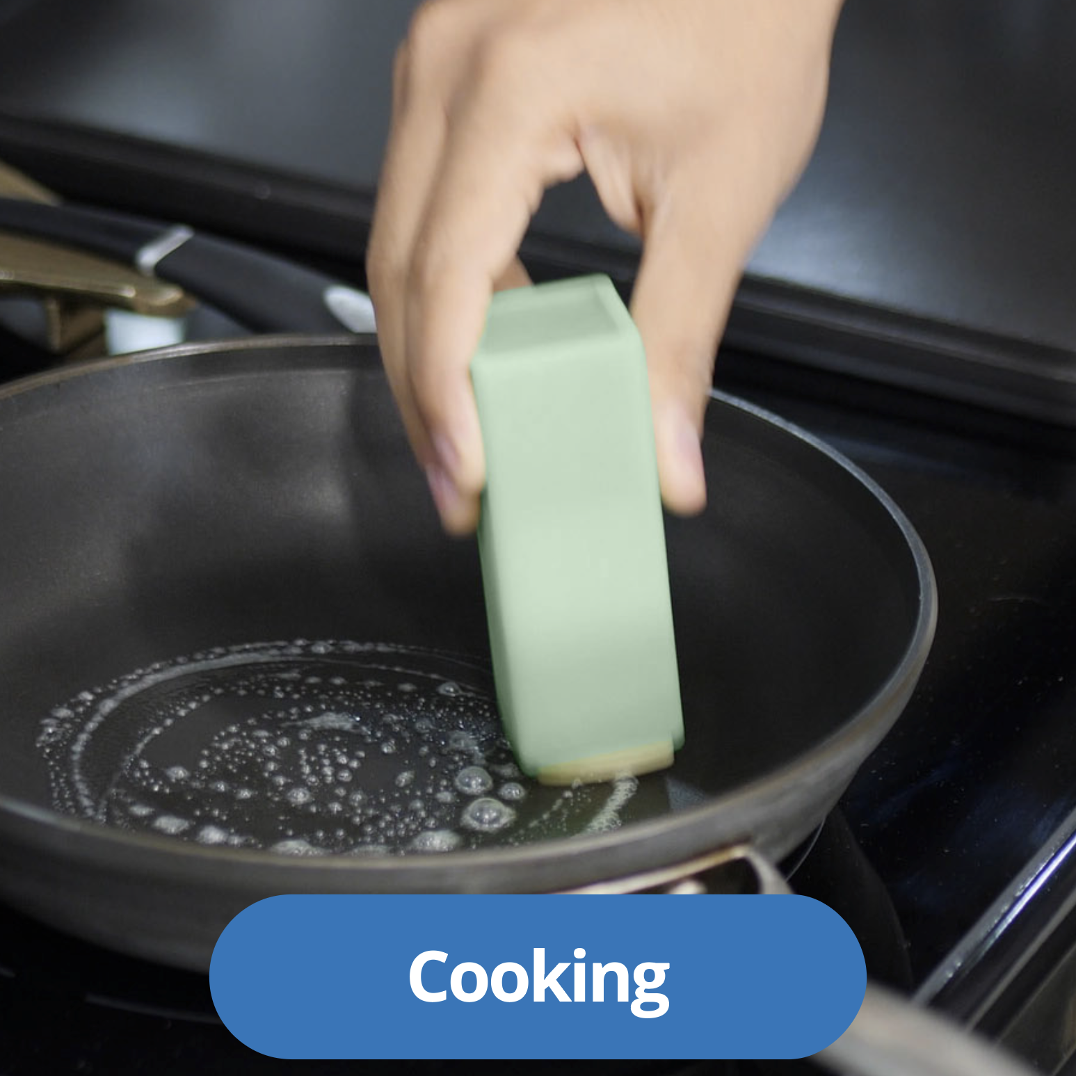 Adding butter to a hot pan safely with a Butter Crayon, without burned fingers