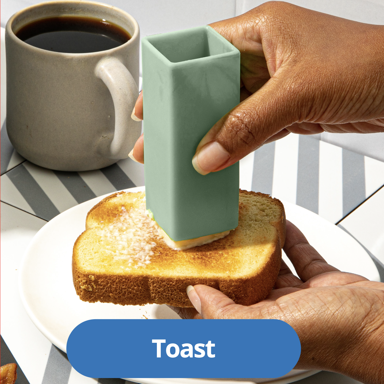 A Butter Crayon spreading a smooth, even layer of butter across a slice of toast
